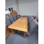 Oak extendable dining table and 6 grey covered high backed chairs