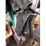 A Leather Motorbike Jacket and 2 Pairs of Trousers