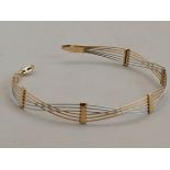 A 14k gold bracelet 5g in two tone gold