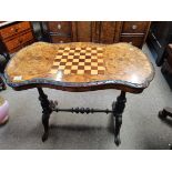 Antique burr walnut games table with carved decora