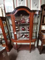 An Edwardian inlaid mahogany display cabinet