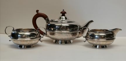 A GEORGE V SILVER THREE-PIECE TEA SERVICE