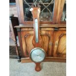 An Antique mahogany barometer with Sheraton inlaid decoratio