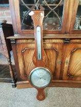 An Antique mahogany barometer with Sheraton inlaid decoratio