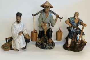 3 x Oriental figures - Chinese man carrying water buckets, 2 x Mudman style figures