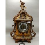 Antique French Brass Mantle clock with Cherub on top