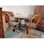 Mid 20th Century Oval Ercol drop leaf kitchen table and 4 Ercol chairs