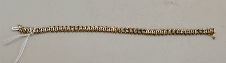 Diamond and gold set bracelet 18cm long 10g