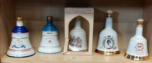5 x commemorative Wade Porcelain decanters with Bell's Scotch Whisky