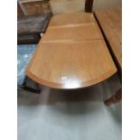 Oak extendable dining table with one leaf