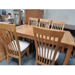 Light Oak extending dining table with 5 chairs
