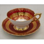 Royal Stafford bone china tea cup and saucer burgundy and gilt