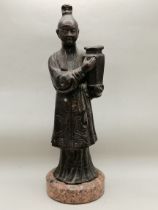 A bronze Japanese figurines of a boy on marble stand