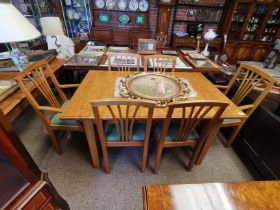 A Yorkshire oak extending dining table with 4 +2 d