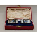 A PAIR OF GEORGE VI SILVER COMMEMORATIVE NAPKIN RINGS