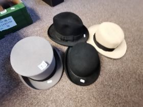 4 Hats to include a Top Hat Marked " Christy's London/Carl Stuart Osset and a Bowler