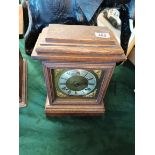 Antique oak mantle clock with brass and silvered f