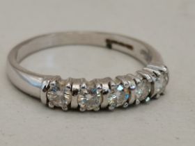 A 5 stone diamond and white gold ring size Q 3g