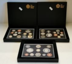 Three Royal Mint UK proof coin sets