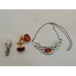 Silver and amber necklace and marcasite reindeer brooch