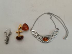 Silver and amber necklace and marcasite reindeer brooch