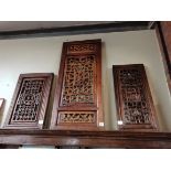 A set of 3 Chinese wall plaques with pierced flora