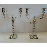 A PAIR OF EDWARADIAN SILVER TWIN-LIGHT CANDELABRA