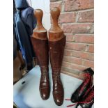 A Pair of Leather Riding Boots With Wooden Lasts