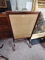 Antique mahogany firescreen with sabre legs and 3