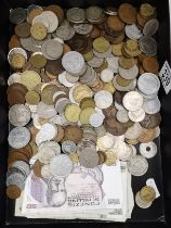 A tray of assorted British and foreign currency, Victorian and later