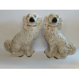 Pair of white seated Staffordshire dogs 33cm Ht