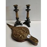 Pair of ornate candlesticks and brass bellows