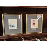 A pair of small paintings of butterflies