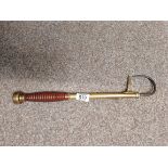 Antique Hardy Alnwick brass with wooden ribbed handle fishing gaff