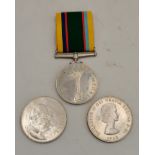 A George VI Cadet Forces Medal, and two Churchill commemorative 1965 crowns