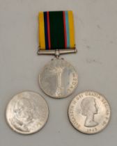 A George VI Cadet Forces Medal, and two Churchill commemorative 1965 crowns