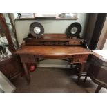 A reproduction mahogany style writing desk