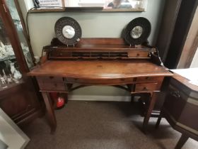 A reproduction mahogany style writing desk