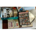Large collection of first day covers, postcards and stamps