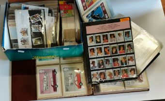 Large collection of first day covers, postcards and stamps