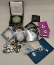 A group of assorted coins and medallions