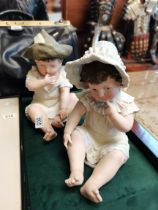 A pair of German bisque 30cm large baby figures