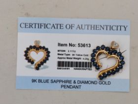 A 9 carat gold sapphire and diamond heart-shaped pendant