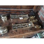 A collection of miniature brass fenders and pair o