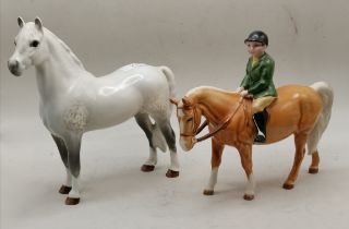 Beswick palomino pony with boy no. 1500 plus white