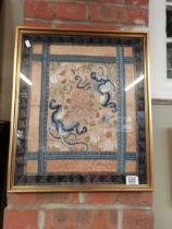 A Chinese silk cloth in frame with embroidery 50cm