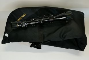 Telescopic rifle sight by Nikko Stirling plus shot gun carrying slip / bag