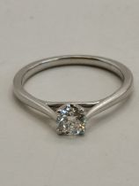 A platinum solitaire ring approx 0.33 k size M 3g