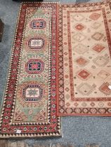 2 x Runner / rugs in reds, blues, creams