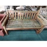 Wooden garden bench in need of restoration